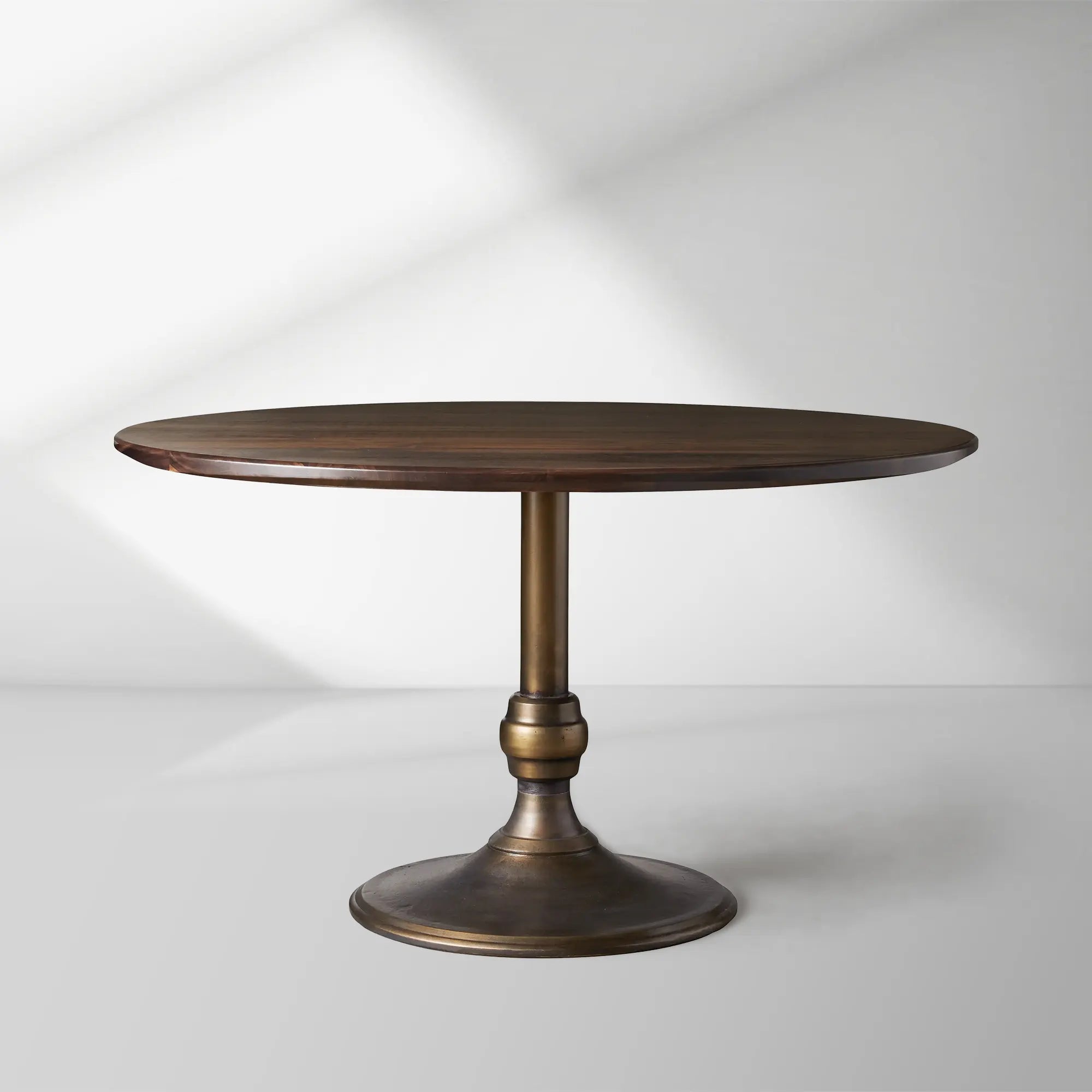 Jacob Round Dining Table with Wade Solid Cast Iron Base