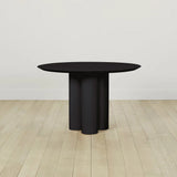 Reade Natural Ash Wood Round Dining Table with Sculptural Columnar Legs
