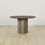 Reade Natural Ash Wood Round Dining Table with Sculptural Columnar Legs