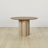 Reade Natural Ash Wood Round Dining Table with Sculptural Columnar Legs